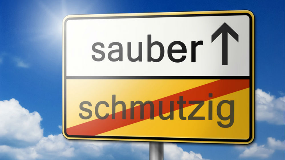 Kaminofen Wartung - Schild schmutzig - sauber